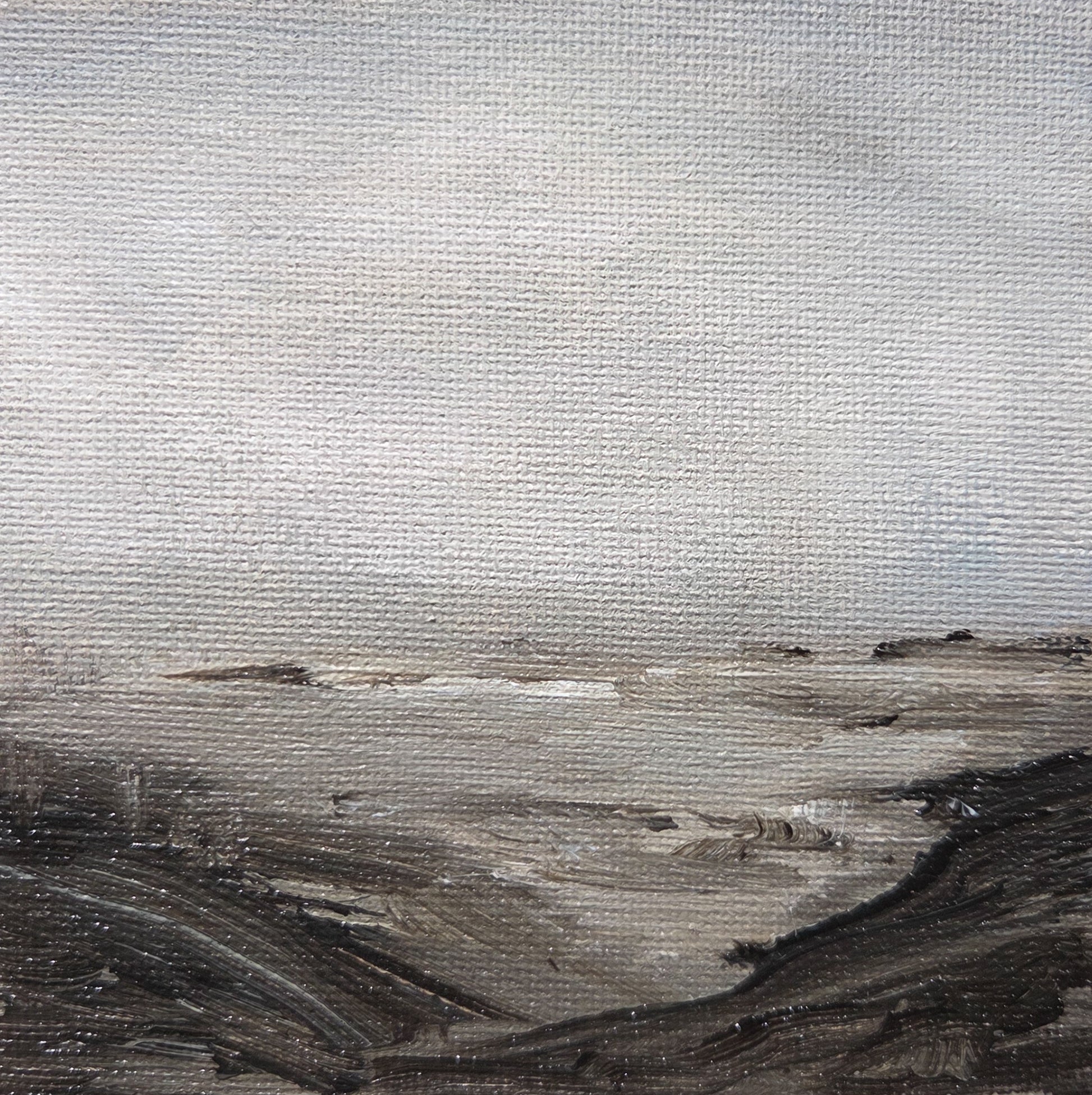 Small, textured abstract landscape painting in neutral tones, featuring a large light sky and dark, low terrain.