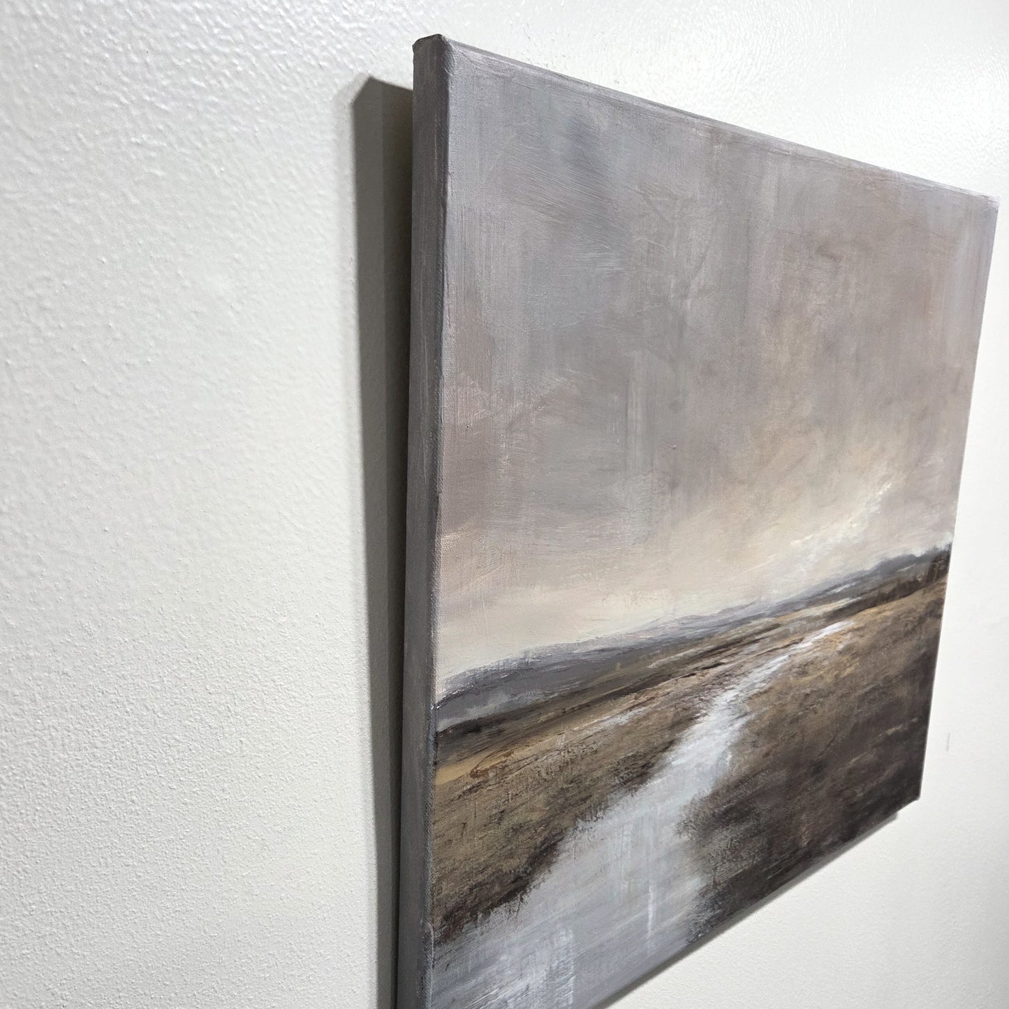 Landscape painting on a white wall